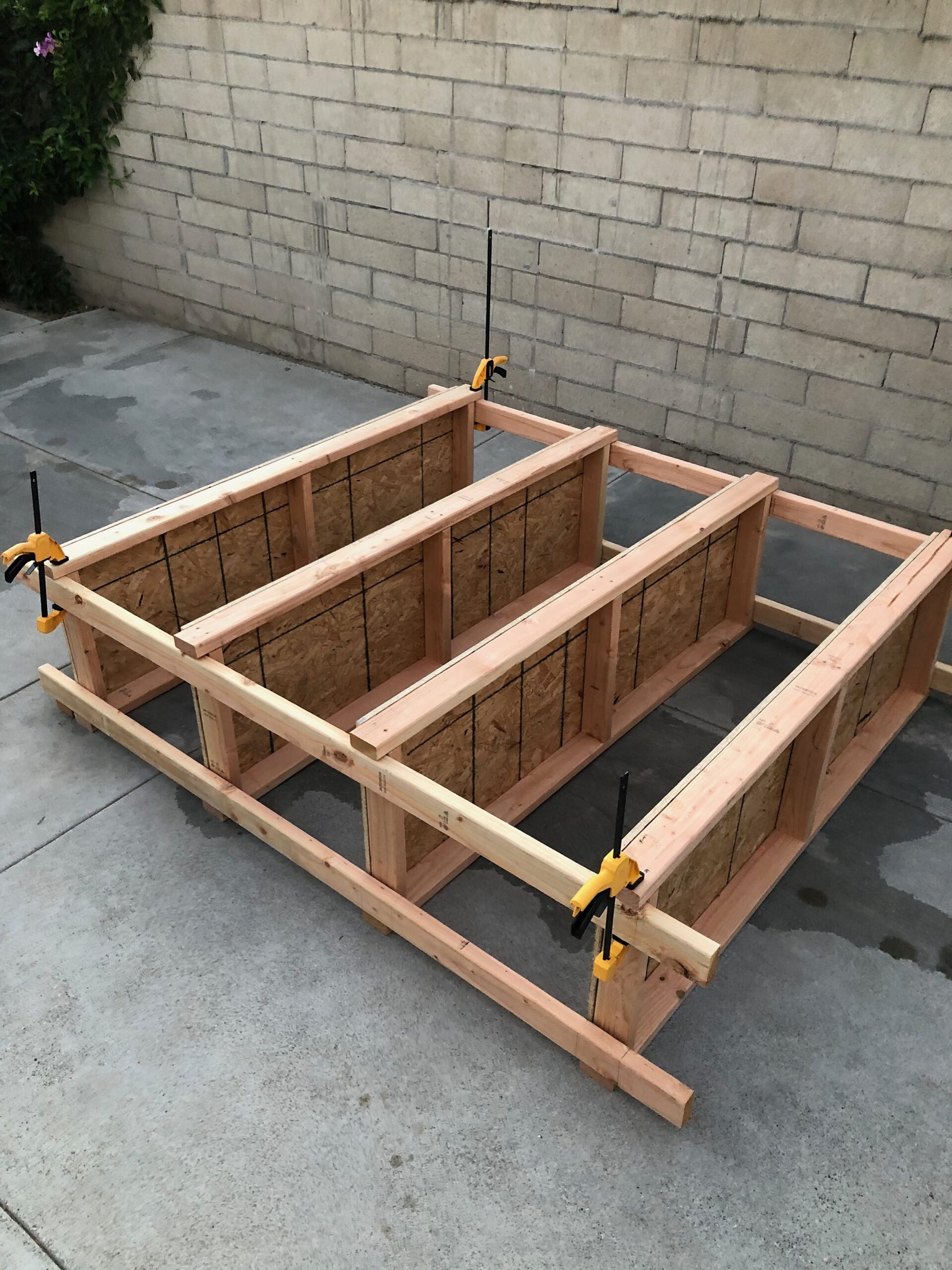 DIY 2×4 Garage Storage Rack With OSB-Divided Bays