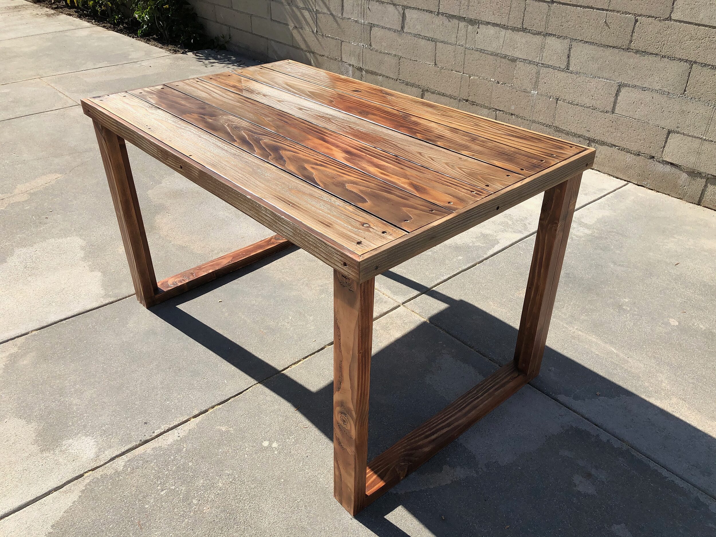 A Modern Rustic Desk with a Torched Wood Top